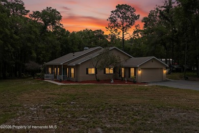 Tucked away on 10.20 secluded, wooded acres, this beautifully - photo 3