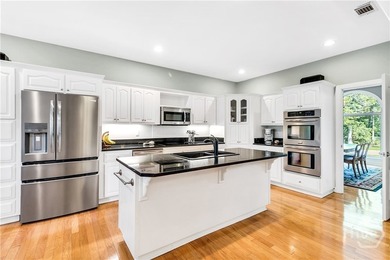 Experience timeless elegance at 2 Hickory Grove Way, a stately - photo 9