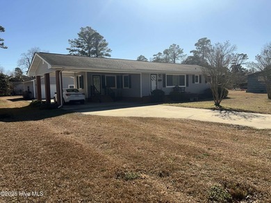 Welcome home to this charming ranch style home on the East end - photo 4