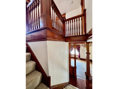 Charming cottage-style home showcasing distinctive woodwork - photo 12