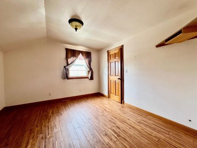 Charming cottage-style home showcasing distinctive woodwork - photo 14