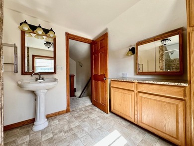 Charming cottage-style home showcasing distinctive woodwork - photo 15