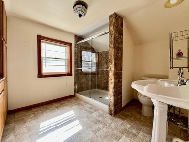 Charming cottage-style home showcasing distinctive woodwork - photo 16