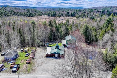 Set on nearly 2 private acres in Freedom, Maine, this unique - photo 3