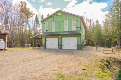 Set on nearly 2 private acres in Freedom, Maine, this unique - photo 9