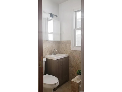 Turnkey 3-unit multifamily in Van Nest, two blocks from the 2 & - photo 6