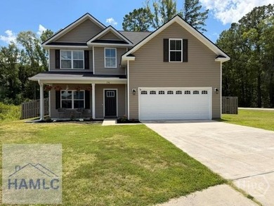 Spacious 4-bedroom 2.5 bath home features grand foyer with - photo 1