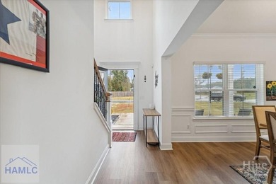 Spacious 4-bedroom 2.5 bath home features grand foyer with - photo 5