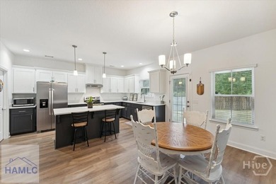 Spacious 4-bedroom 2.5 bath home features grand foyer with - photo 10