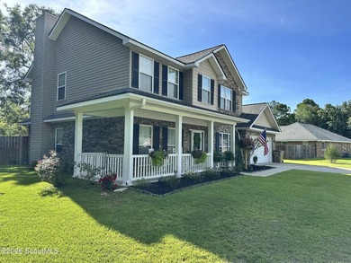 Welcome to this beautifully maintained 5-bedroom, 3-bath brick - photo 3