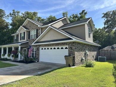 Welcome to this beautifully maintained 5-bedroom, 3-bath brick - photo 5