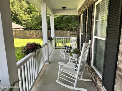 Welcome to this beautifully maintained 5-bedroom, 3-bath brick - photo 7