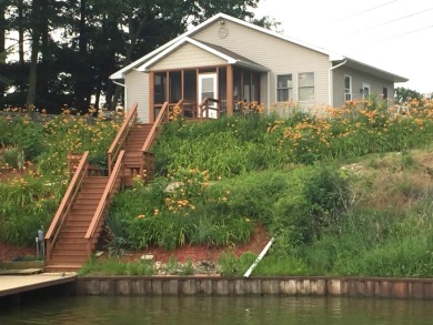 Custom Cabin with Amazing Water Frontage and Dock w/ Double Lift - Lake Home For Sale in Neoga, Illinois