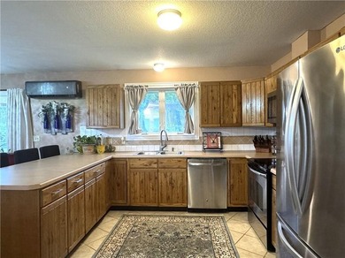 This 3 bedroom 2 bathroom ranch home is located within the gated - photo 11