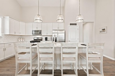 Don't wait too long to see this GEM! Built in 2021, this - photo 12