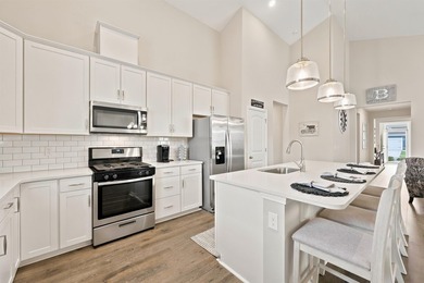 Don't wait too long to see this GEM! Built in 2021, this - photo 17