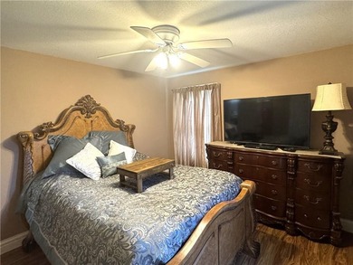 This 3 bedroom 2 bathroom ranch home is located within the gated - photo 17