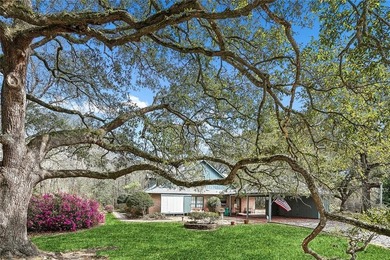Your own private retreat is tucked away in the woods just  1/2 - photo 26