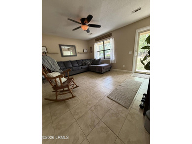 Charming 3-bedroom, 1.5-bath brick home situated on nearly half - photo 16