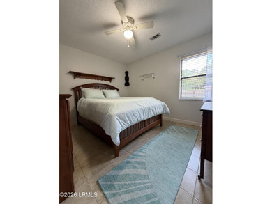 Charming 3-bedroom, 1.5-bath brick home situated on nearly half - photo 18