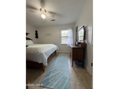 Charming 3-bedroom, 1.5-bath brick home situated on nearly half - photo 19