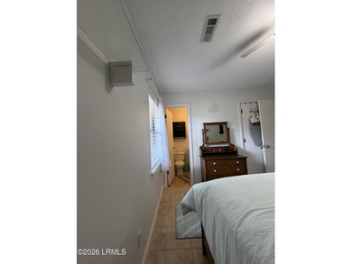 Charming 3-bedroom, 1.5-bath brick home situated on nearly half - photo 20