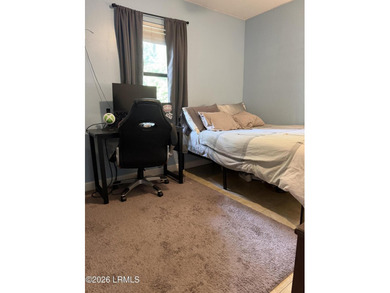 Charming 3-bedroom, 1.5-bath brick home situated on nearly half - photo 23