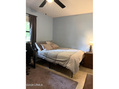 Charming 3-bedroom, 1.5-bath brick home situated on nearly half - photo 24