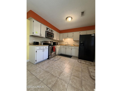 Charming 3-bedroom, 1.5-bath brick home situated on nearly half - photo 27