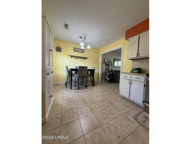 Charming 3-bedroom, 1.5-bath brick home situated on nearly half - photo 28