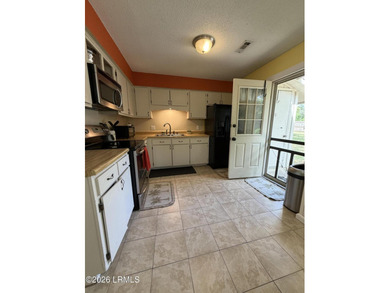 Charming 3-bedroom, 1.5-bath brick home situated on nearly half - photo 29