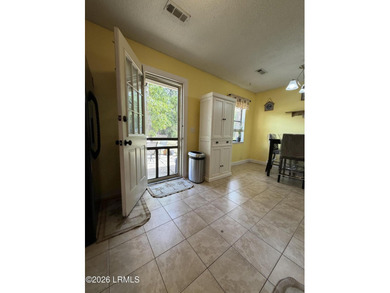 Charming 3-bedroom, 1.5-bath brick home situated on nearly half - photo 31