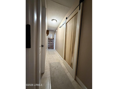 Charming 3-bedroom, 1.5-bath brick home situated on nearly half - photo 33