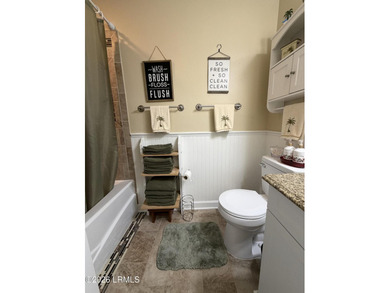 Charming 3-bedroom, 1.5-bath brick home situated on nearly half - photo 35