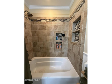 Charming 3-bedroom, 1.5-bath brick home situated on nearly half - photo 36