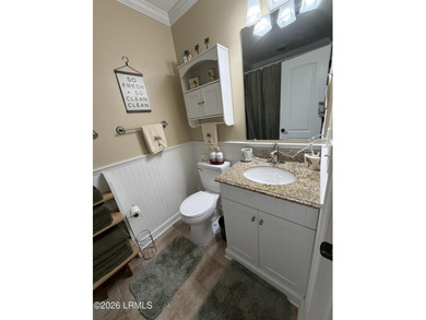 Charming 3-bedroom, 1.5-bath brick home situated on nearly half - photo 38