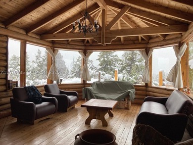 Exceptional handcrafted log home built with solid cypress logs - photo 12