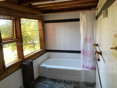 Exceptional handcrafted log home built with solid cypress logs - photo 13