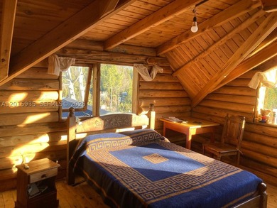 Exceptional handcrafted log home built with solid cypress logs - photo 14