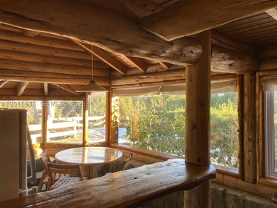Exceptional handcrafted log home built with solid cypress logs - photo 16