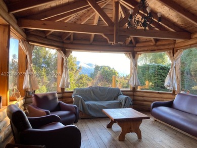 Exceptional handcrafted log home built with solid cypress logs - photo 21