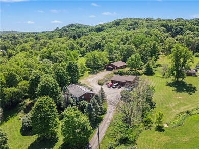 17.8 Acres + Multiple Dwellings + Exceptional Amenities! A rare - photo 1
