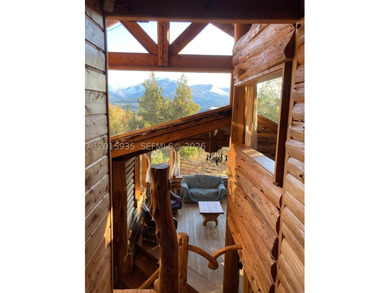 Exceptional handcrafted log home built with solid cypress logs - photo 23
