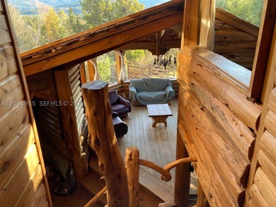 Exceptional handcrafted log home built with solid cypress logs - photo 24