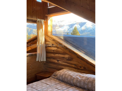Exceptional handcrafted log home built with solid cypress logs - photo 25