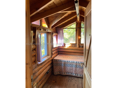 Exceptional handcrafted log home built with solid cypress logs - photo 26