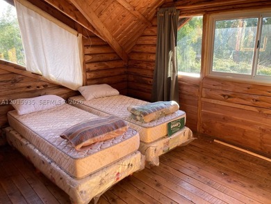 Exceptional handcrafted log home built with solid cypress logs - photo 27