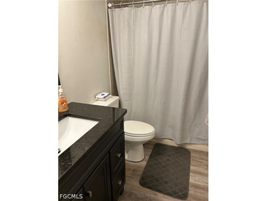Gulf Access 2 bed 2 bath 1 car carport condo with 10k boat lift - photo 12
