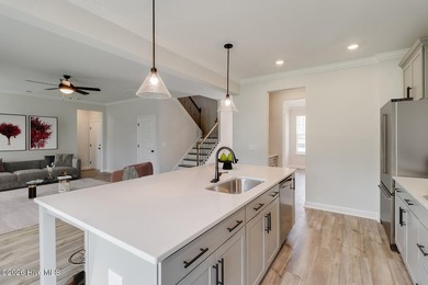 The Nottely is a two-story home with five bedrooms and three and - photo 6