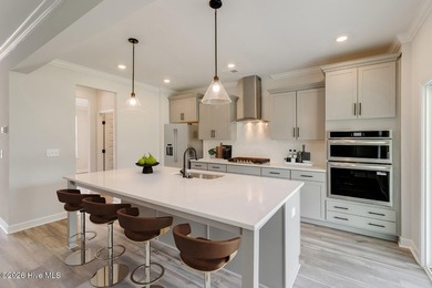 The Nottely is a two-story home with five bedrooms and three and - photo 7